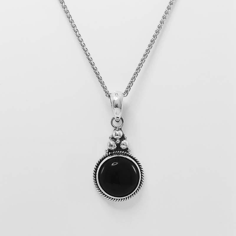 Small Round Onyx Pendant with a silver chain.
