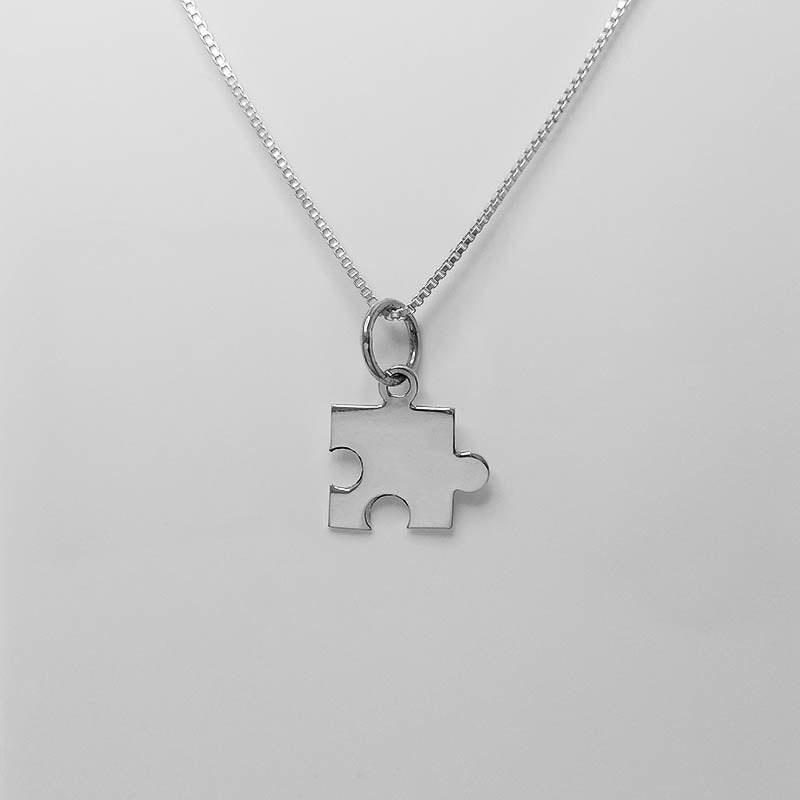 Silver Puzzle Piece Charm with a silver chain