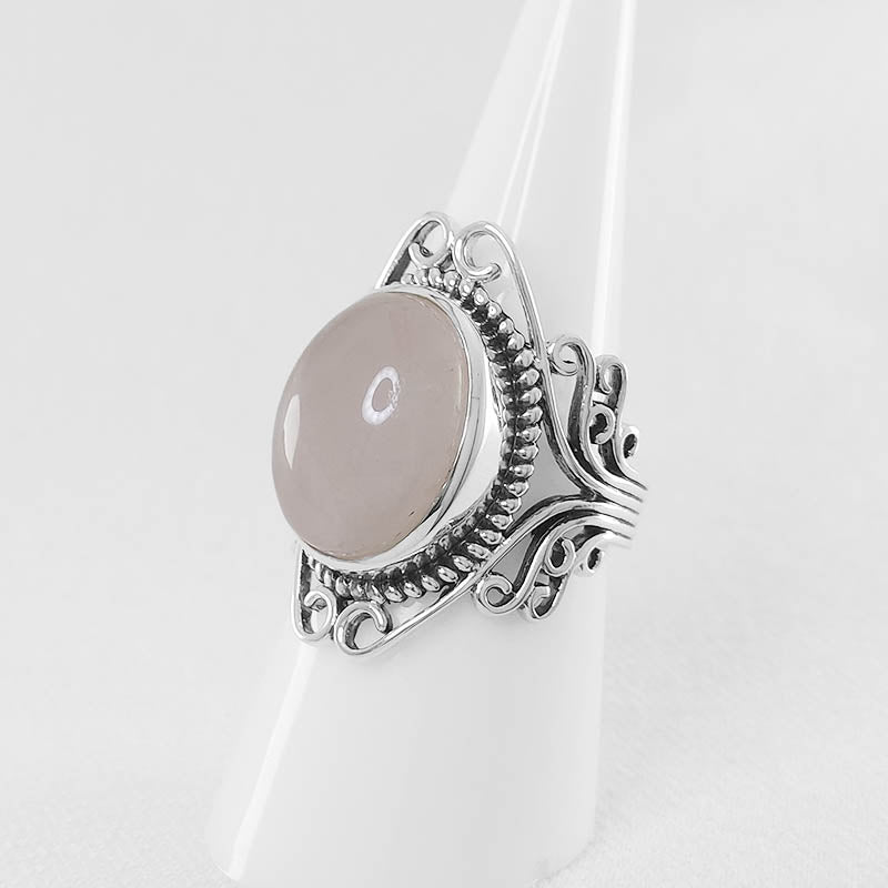 Sterling Silver Rose Quartz ring with a filigree design