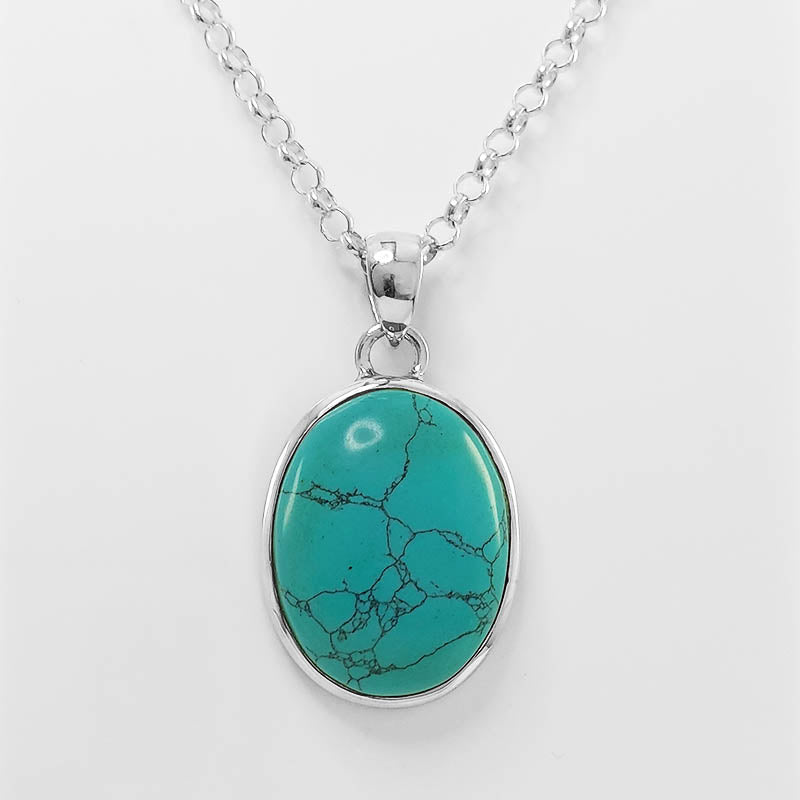 Sterling silver turquoise pendant with a silver chain.