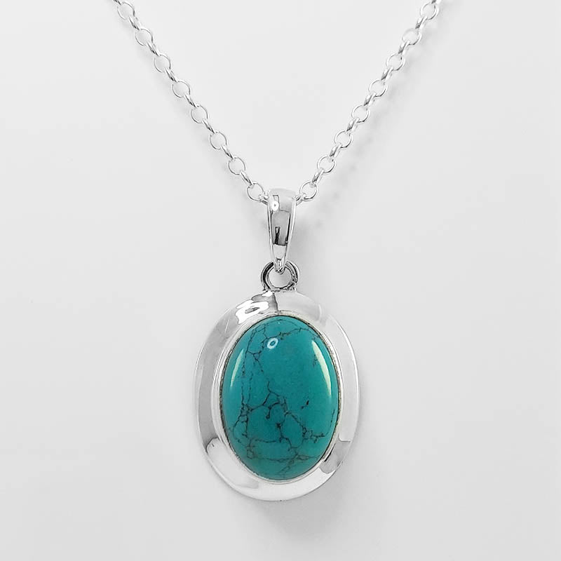 Sterling Silver Oval Turquoise pendant with a silver chain 