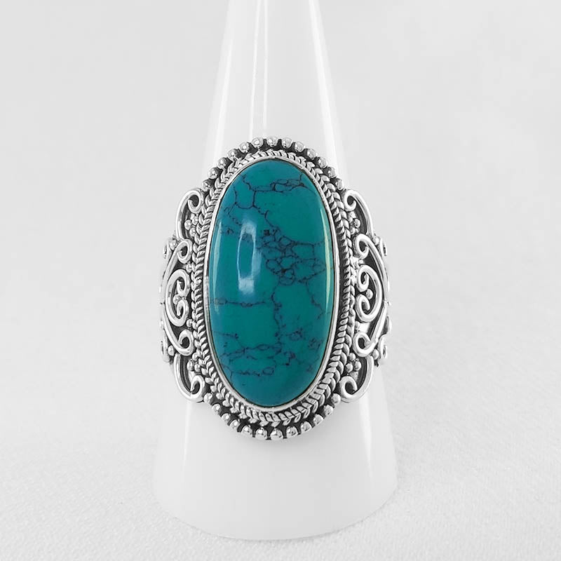 Sterling Silver Turquoise Ring with a Filigree Design