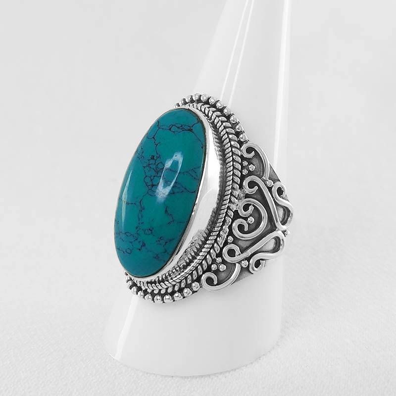 Sterling Silver Turquoise Ring with a Filigree Design